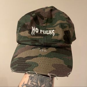 NWOT Spencer’s Distressed “No Fucks” Camo Hat